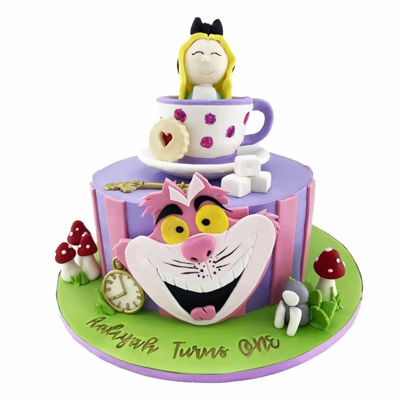 Alice in Wonderland-themed cake with Alice in a teacup, Cheshire Cat stripes, and mini toadstools and biscuits